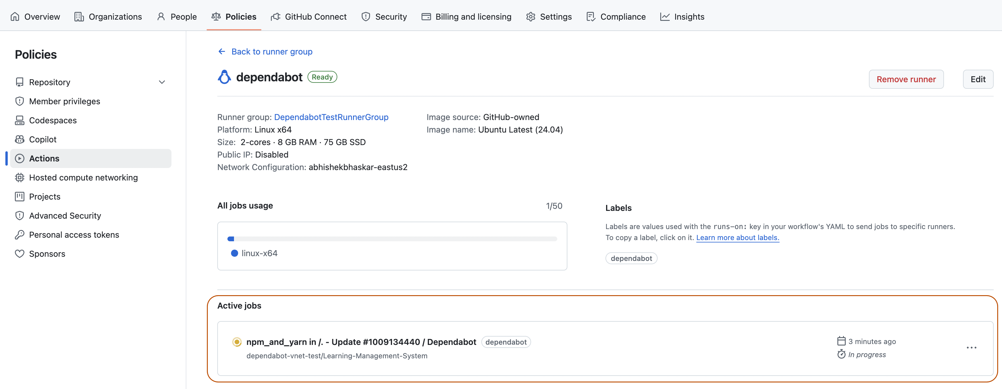 Screenshot showing a Dependabot runner's active jobs.